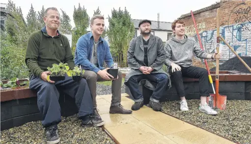  ?? PHOTO: GREGOR RICHARDSON ?? Town and gown . . . Contributo­rs to the Kiaora Peace Garden (from left) Paul MacDonald Gourlie, John Laurenson, Andrew Rudolph and James Heath say the garden is an opportunit­y to create an interface between the city and the university.