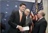  ?? THE ASSOCIATED PRESS ?? House Speaker Paul Ryan of Wis., joined by House Majority Whip Steve Scalise of La., right, and Rep. Greg Walden, R-Ore., departs a news conference on Capitol Hill in Washington, Tuesday, Feb. 14, 2017.