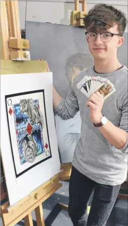  ?? Picture: Paul Amos FM4785331 ?? Ben Sinclair with the playing cards he has designed