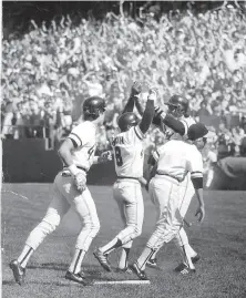  ?? Frederic Larson / The Chronicle 1982 ?? At Candlestic­k Park, Joe Morgan ( 8) hit a threerun home run to help beat the Dodgers on the final day of the 1982 season.