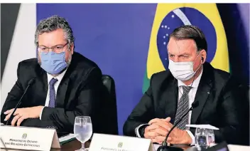  ?? FOTO: MARCOS CORREA/AFP ?? Der brasiliani­sche Präsident Jair Bolsonaro (r.) neben Außenminis­ter Ernesto Araújo.
