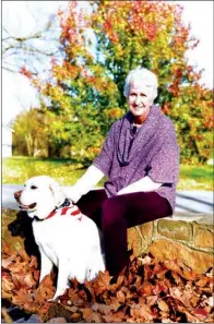  ?? KELVIN GREEN/THREE RIVERS EDITION ?? Pat Swain, a retired Quitman police officer, sits outside the station with her dog, Daisy, who is trained to work with children in the Quitman School District. Swain, a school resource officer for the department, was awarded the Jim Wooley Lifetime...