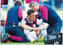  ??  ?? TV TERROR: Tommy Elphick suffers a head injury in the first game of the season against Sheffield Wednesday, a match live on Sky