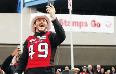  ?? DARREN MAKOWICHUK ?? Stamps all-star linebacker Alex Singleton takes a selfie during Tuesday’s Grey Cup celebratio­ns. The 24-year-old Singleton is one name on a star-studded list of Calgary starters who can test the free agent waters in the off-season.