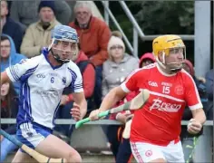  ??  ?? Brian O’Loughlin of Monageer-Boolavogue is pursued by Craanford’s William Conroy in The Courtyard Ferns IHC quarter-final.