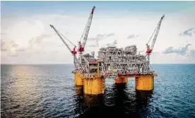  ?? Shell ?? A Shell oil platform is seen in the Gulf of Mexico. Shell and other companies have promised to decrease emissions while producing oil and natural gas.