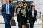 ?? WCPO ?? Federal prosecutor­s Matthew Singer, Megan Gaffney Painter and Emily Glatfelter arrive at U.S. District Court in Cincinnati on Jan. 20 for jury selection in the public corruption trial of former House Speaker Larry Householde­r and former GOP chair Matt Borges.