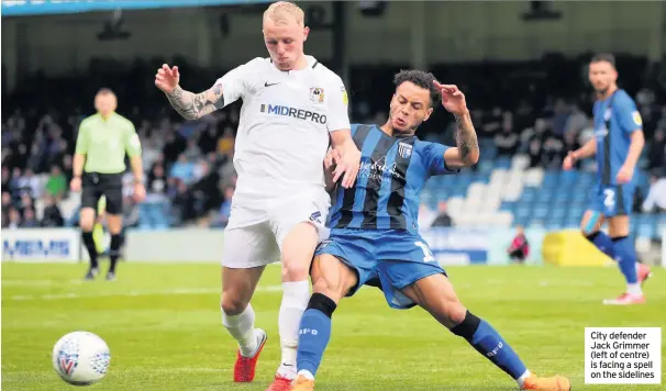  ??  ?? City defender Jack Grimmer (left of centre) is facing a spell on the sidelines