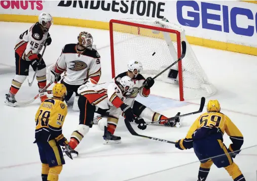  ??  ?? Roman Josi (59) of the Nashville Predators scores the game-winning goal against John Gibson (36) of the Anaheim Ducks during the third period in Game 3 of the Western Conference Final during the 2017 Stanley Cup Playoffs at Bridgeston­e Arena on Tuesday...