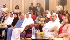  ?? Supplied photo ?? Humaid Al Qatami and others guests listen to cancer survivors during the ‘Pink Knight’ programme organised by Zulekha Hospital Group. —