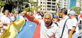  ?? AP ?? Supporters of opposition coalition presidenti­al hopeful Maria Corina Machado attend her campaign event in Caracas, Venezuela, on Tuesday.