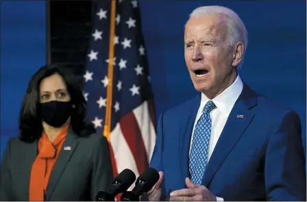  ?? CAROLYN KASTER — THE ASSOCIATED PRESS ?? President-elect Joe Biden, joined by Vice President-elect Kamala Harris, speaks at The Queen theater, Monday, Nov. 9, in Wilmington, Del.
