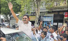  ?? PTI FILE ?? Rebel AIADMK leader TTV Dinakaran waves to his supporters before filing papers for the RK Nagar bypoll.