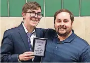  ?? [PHOTO PROVIDED] ?? Payton Woolard, left, will be competing in June at the National Speech and Debate Associatio­n national tournament. Woolard is pictured with his debate coach, Michael Ferguson.