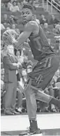  ?? Yi-Chin Lee / Houston Chronicle ?? Rockets center Clint Capela is attempting to broaden his offensive game beyond catching lob passes for dunks.