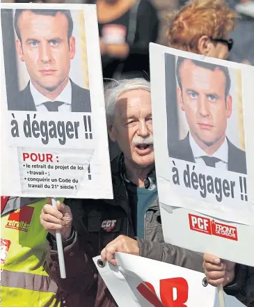  ??  ?? POPULAR DISCONTENT: Demonstrat­ors take to the streets of Paris to protest against the government’s labour reforms on Tuesday.