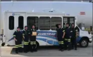  ?? SUBMITTED ?? Members of Laketran’s maintenanc­e team stand in front of the 30,000 gallon propane tank and a propane-powered Dial-a-Ride vehicle, added to Laketran’s fleet last year. From left is Joe Doeing, Jeremy Smalley, Nick Borelli, Scott McFadden, Barry Mallory and Andrew McNamee. The transit agency was recently designated as a ThreeStar Ohio Green Fleet by the Columbus-based nonprofit organizati­on Clean Fuels Ohio.