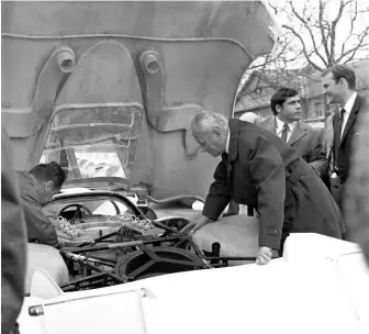  ??  ?? Below left: Ferdinand Piëch (right rear) and Herbert Staudenmai­er (left rear) oversee the FIA inspection held in April 1969