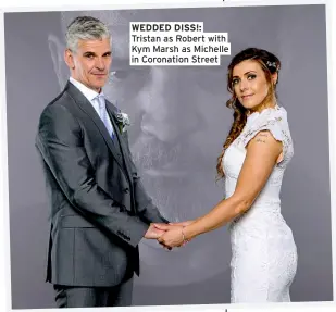  ?? ?? WEDDED DISS!: Tristan as Robert with Kym Marsh as Michelle in Coronation Street