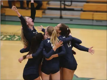  ?? PHOTOS BY DOUGLAS ZIMMERMAN — SPECIAL TO MARIN INDEPENDEN­T JOURNAL ?? Marin Catholic’s Kari Geissberge­r (left) celebrates with teammates following the Wildcats’ four-set win against Redwood in the MCAL Championsh­ip Game in San Anselmo on Oct. 25.