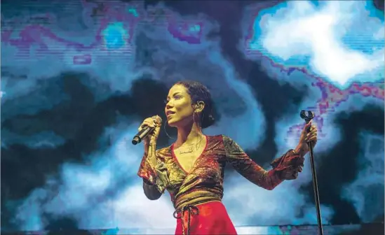  ?? Ricardo DeAratanha Los Angeles Times ?? JHENÉ AIKO, shown at Staples Center in June, has a new album out, “Trip,” which is part of a multimedia endeavor that includes a short film and a book of poetry.