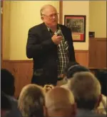  ??  ?? Jim Davis addresses the IVCFA Hall of Fame attendees after being inducted on Saturday night. KARINA LOPEZ PHOTO