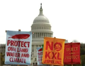  ??  ?? Activists protest against the Keystone XL pipeline in front of the US Capitol in Washington 22 April 2014. There has been an uptick in civil disobedien­ce and direct actions challengin­g fossil fuel infrastruc­ture projects. Photograph: Gary Cameron/Reuters