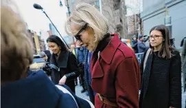  ?? Michael M. Santiago/Getty Images ?? E. Jean Carroll leaves Manhattan Federal Court on Friday in New York City.