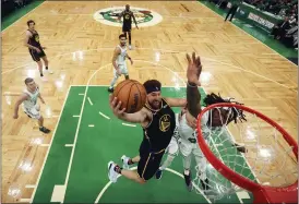  ?? KYLE TERADA — POOL PHOTO VIA AP ?? Golden State Warriors guard Klay Thompson (11) puts up a shot against Boston Celtics center Robert Williams III (44) during Game 3of the NBA Finals, Wednesday, in Boston.