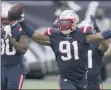  ?? CHARLES KRUPA - THE ASSOCIATED PRESS ?? New England Patriots defensive lineman Deatrich Wise Jr. celebrates after he recovered a fumble for a touchdown in the second half of an NFL football game against the Las Vegas Raiders, Sunday, Sept. 27, 2020, in Foxborough, Mass.