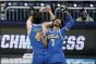  ?? MICHAEL CONROY — THE ASSOCIATED PRESS ?? UCLA guard Jaime Jaquez Jr. (4) and Johnny Juzang (3) celebrate after beating Alabama 88-78in overtime of a Sweet 16 game in the NCAA men’s college basketball tournament at Hinkle Fieldhouse in Indianapol­is, Sunday, March 28, 2021.