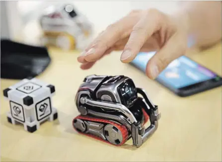  ?? THE ASSOCIATED PRESS FILE PHOTO ?? The Cozmo coding robot is displayed at CES Internatio­nal trade show in Las Vegas in January.