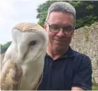 ??  ?? Fergus with Optimus the barn owl
