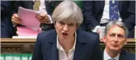  ?? - Parliament TV handout via Reuters ?? DEFINING MOMENT: British Britain’s Prime Minister Theresa May speaks in Parliament as she announces that she has sent the letter to trigger the process of leaving the European Union in London, on Wednesday.