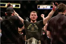  ?? ASSOCIATED PRESS ?? IN THIS JAN. 21 FILE PHOTO, Stipe Miocic gestures after a win over Francis Ngannou during a heavyweigh­t championsh­ip mixed martial arts bout at UFC 220 in Boston.