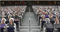  ?? Jon Shapley / Staff photograph­er ?? Fan cutouts were placed in stands before the Texans’ game against the Baltimore Ravens at NRG Stadium. The team hopes to get approval for 15,000 fans to attend the next home game on Oct. 4.