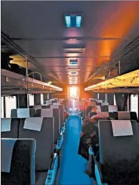  ??  ?? Light bursts through the back window of the Southwest Chief ’s last train car as we travel due west across Kansas at sunrise.