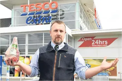  ?? Picture: Jim Irvine. ?? John Fyall visited Tesco’s Danestone supermarke­t in Aberdeen to make the NSA’s concerns known.