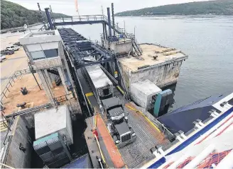  ?? TINA COMEAU ?? A transport truck drives onto the Fundy Rose ferry prior to a summer crossing between Digby and Saint John, N.B.