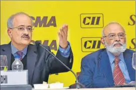  ?? PTI ?? ▪ Chairman of CII Trade Fairs Council, Vipin Sondhi (left) and SIAM president Abhay Firodia (right) at a press conference in New Delhi on Tuesday.