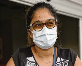  ?? ?? Kruti Pandya is 34; she lives with in-laws in their 80s, so she is “very careful.” Pandya has lost a few members of her extended family to COVID-19. “No one’s wearing a mask now; it’s the new normal . ... I wear mine, do my sanitizer. It’s up to individual responsibi­lity.”