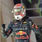  ?? GIUSEPPE CACACE/AFP VIA GETTY IMAGES ?? Max Verstappen celebrates after winning the Bahrain Formula 1 Grand Prix at Bahrain Internatio­nal Circuit.