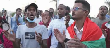  ?? Associated Press ?? Protesters gather to commemorat­e the two-year anniversar­y of a crackdown in Khartoum on Tuesday.