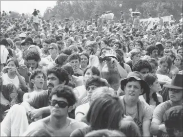  ?? STF ?? In this Aug. 15, 1969 file photo, concert goers attend the Woodstock Music and Arts Festival held on a 600-acre pasture in the Catskill Mountains near White Lake in Bethel, N.Y.