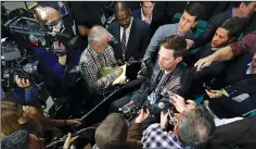  ?? CURTIS COMPTON/TRIBUNE NEWS SERVICE ?? Kyle Shanahan, then offensive coordinato­r for the Atlanta Falcons, is surrounded by a host of reporters asking questions about his future during Super Bowl Opening Night on January 30 in Houston, Texas.