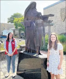  ?? MOTHER MCAULEY ?? Catherine McAuley Award recipients for Mercy Day 2020 Lauren Dowden, left, and Colleen Rooney stand outside Mother McAuley High School.