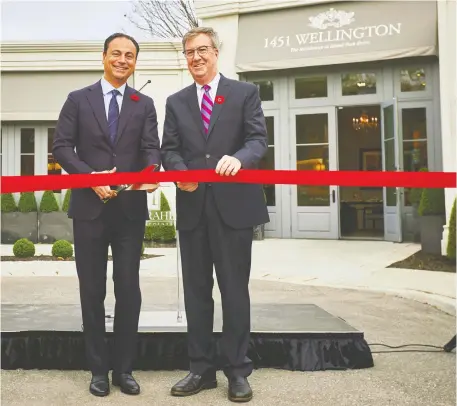  ??  ?? Developer Sam Mizrahi, with Mayor Jim Watson, says 1451 Wellington will be “comparable to a five-star hotel.”