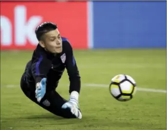  ?? MATT ROURKE — THE ASSOCIATED PRESS ?? U.S. goalie Jesse Gonzalez warms up for a CONCACAF Gold Cup quarterfin­al match against El Salvador, in Philadelph­ia, last week. soccer