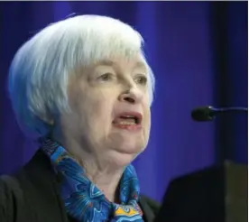  ?? CLIFF OWEN — THE ASSOCIATED PRESS ?? Federal Reserve Chair Janet Yellen speaks at the Federal Reserve System Community Developmen­t Research Conference in Washington, Thursday. Yellen said a new Federal Reserve survey has found that children who grew up in poverty were twice as likely to...
