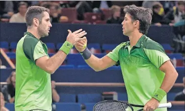  ??  ?? PRESUNTOS IMPLICADOS. David Marrero y Fernando Verdasco, durante un partido de dobles.